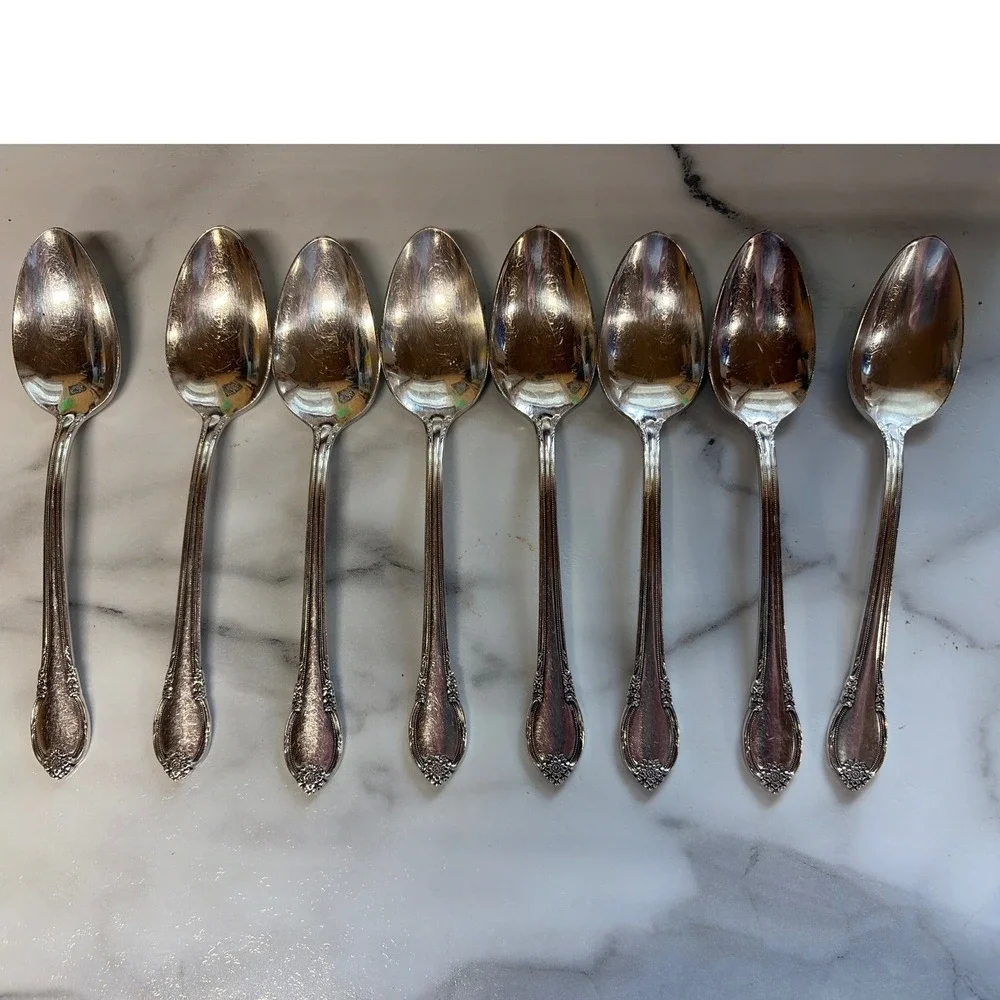 1847 Rogers Bros Remembrance silverplate flatware set in a vintage wooden chest